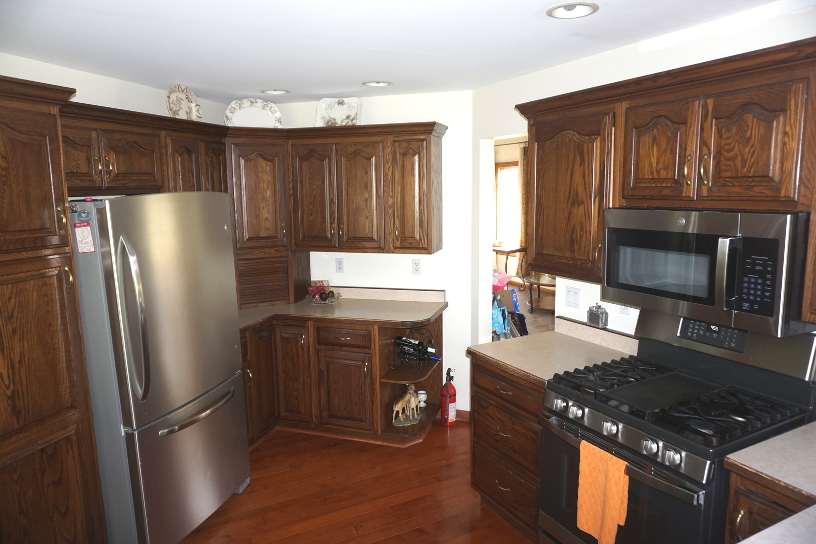 4914 Highway 113 Kankakee, IL 60901 - Photo 18 of 54 a kitchen with stainless steel appliances granite countertop a refrigerator stove and sink