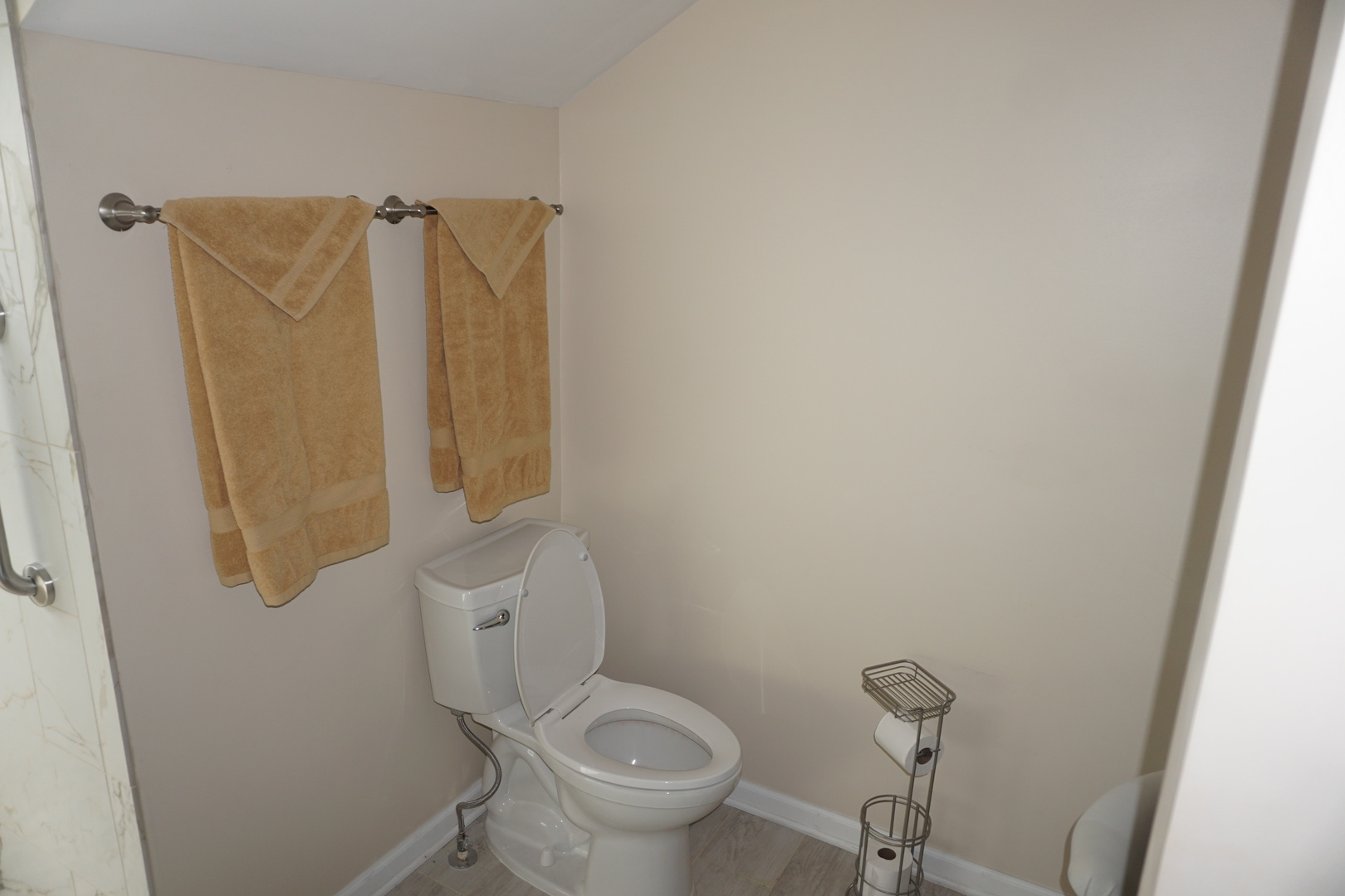 4914 Highway 113 Kankakee, IL 60901 - Photo 36 of 54 a white toilet sitting next to a small bathroom