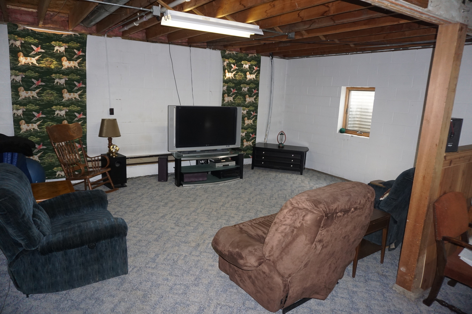 4914 Highway 113 Kankakee, IL 60901 - Photo 41 of 54 a living room with furniture and a flat screen tv