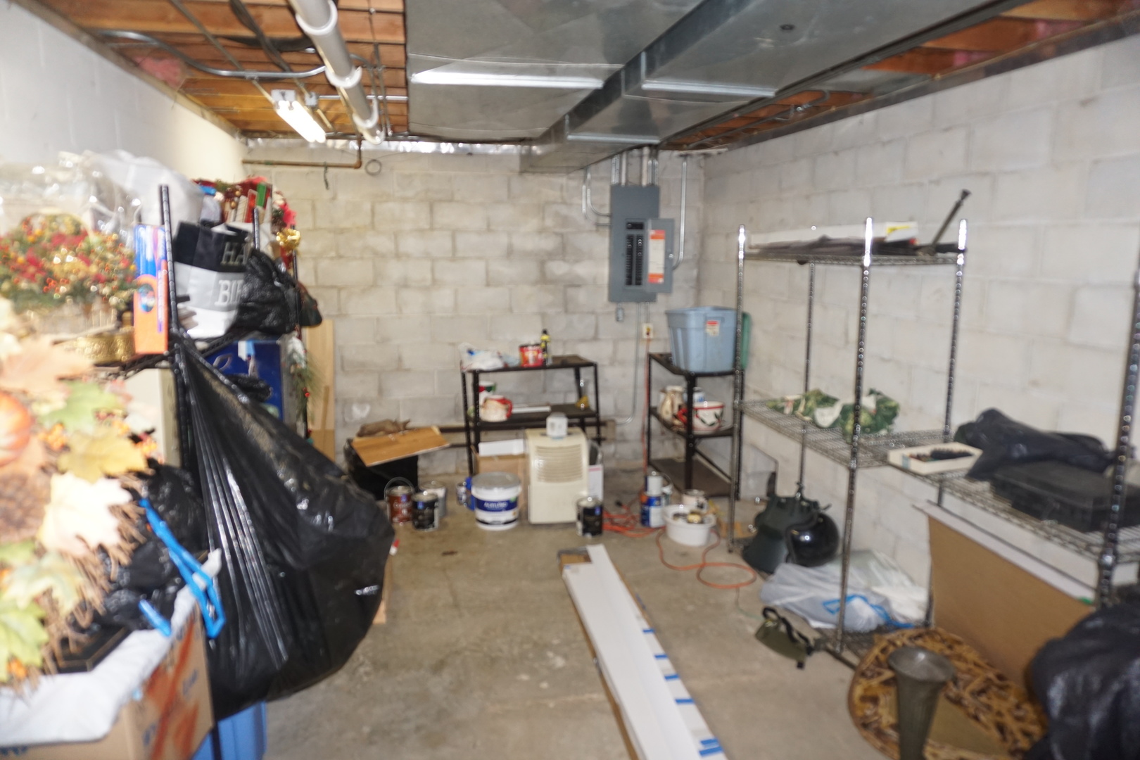 4914 Highway 113 Kankakee, IL 60901 - Photo 47 of 54 a living room with lots of furniture and a wooden floor
