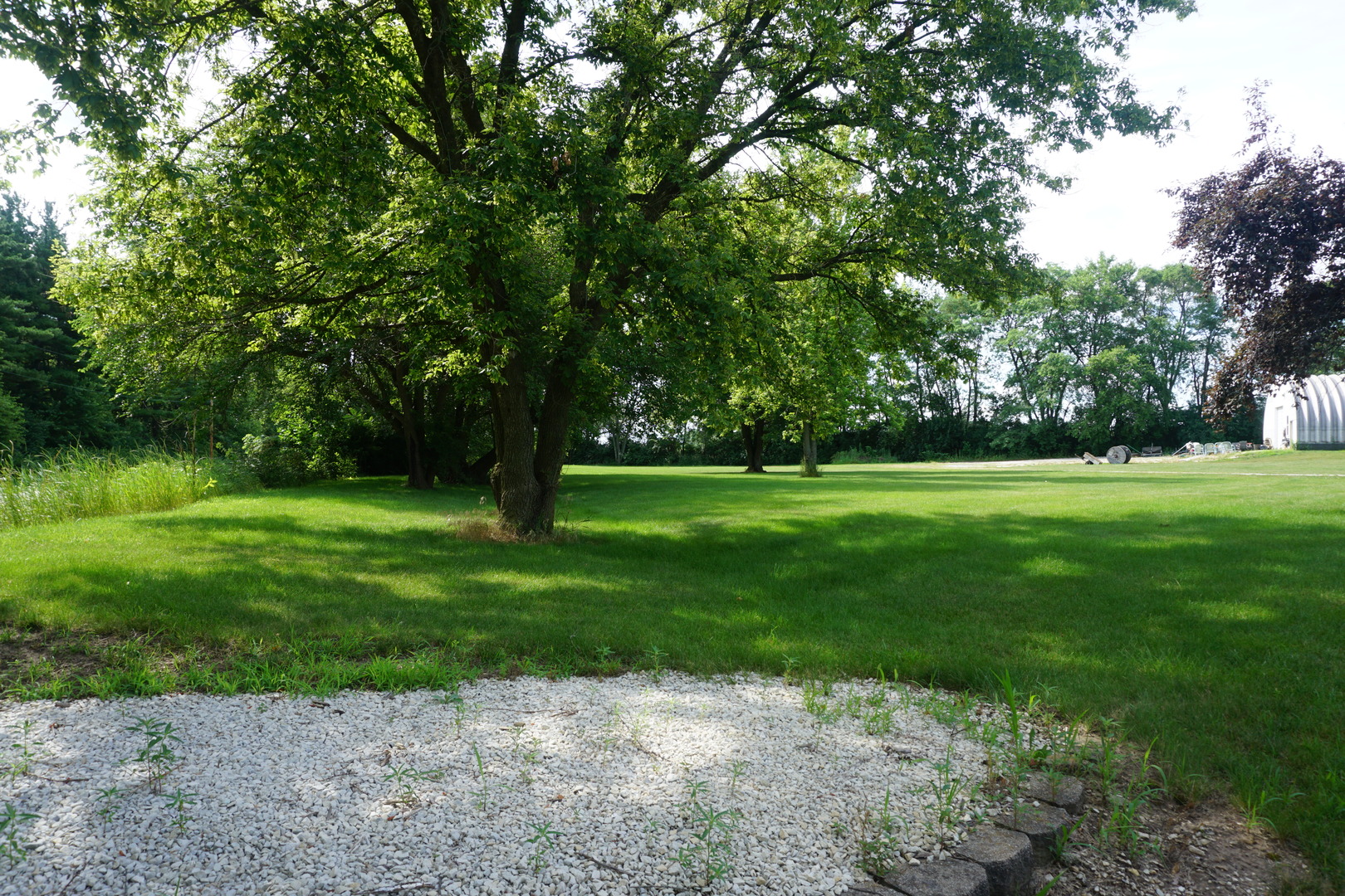 4914 Highway 113 Kankakee, IL 60901 - Photo 8 of 54 a view of a park with large trees