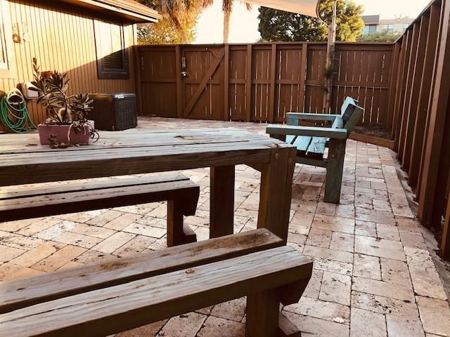 9301 Southwest 130th Street Miami, FL 33176 - Photo 11 of 13 a view of wooden floor with a chair