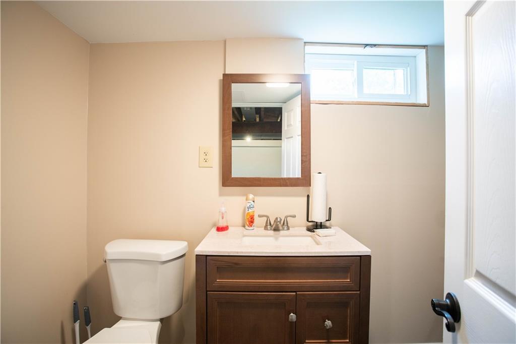 490 Barclay Hill Road Beaver, PA 15009 - Photo 17 of 26 a bathroom with a sink a toilet and mirror