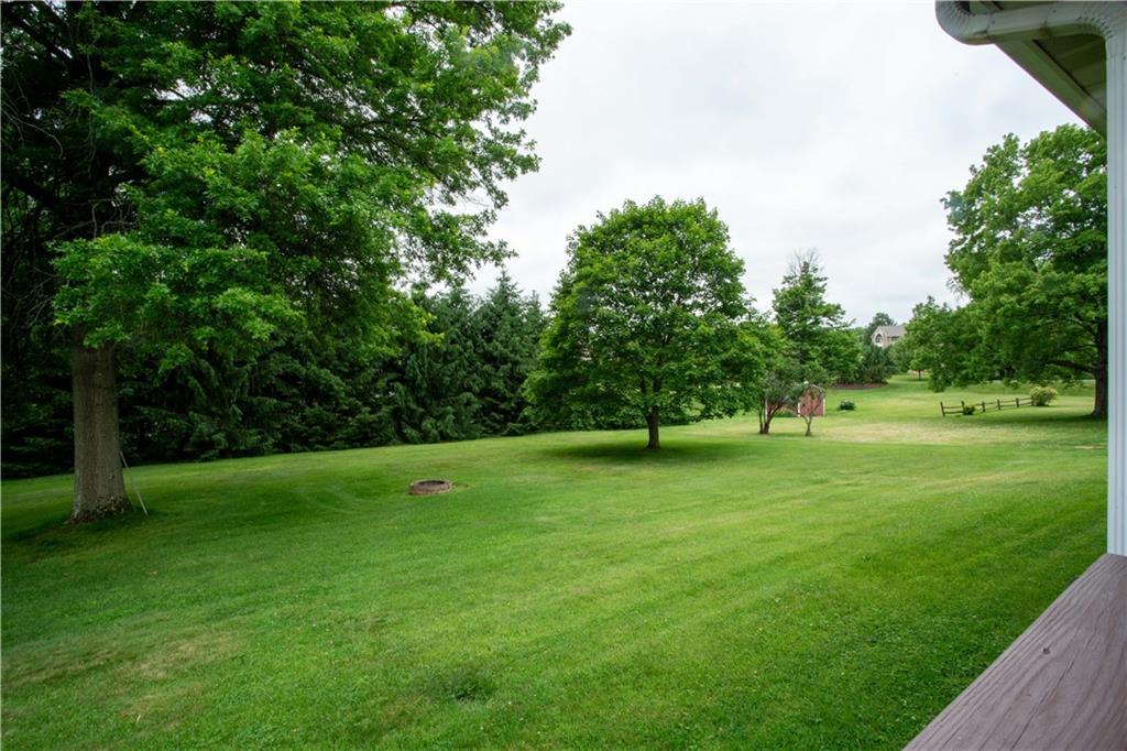 490 Barclay Hill Road Beaver, PA 15009 - Photo 22 of 26 a green field with lots of trees in it
