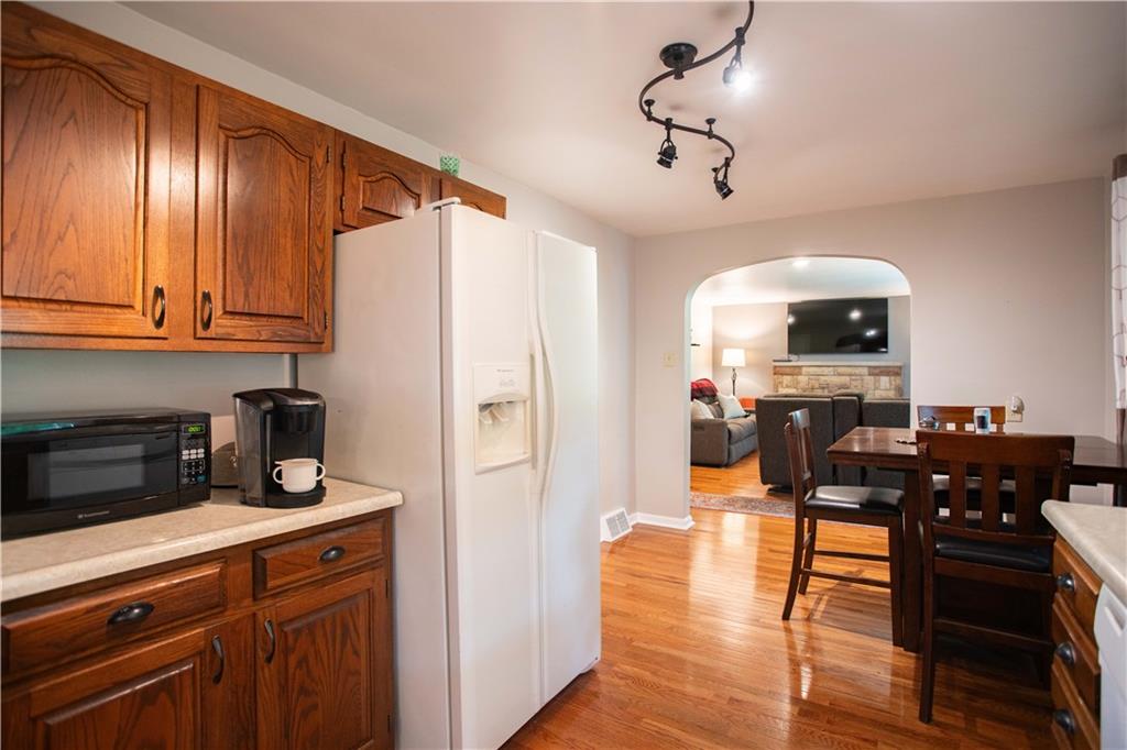 490 Barclay Hill Road Beaver, PA 15009 - Photo 3 of 26 a kitchen with stainless steel appliances granite countertop a refrigerator and a stove top oven