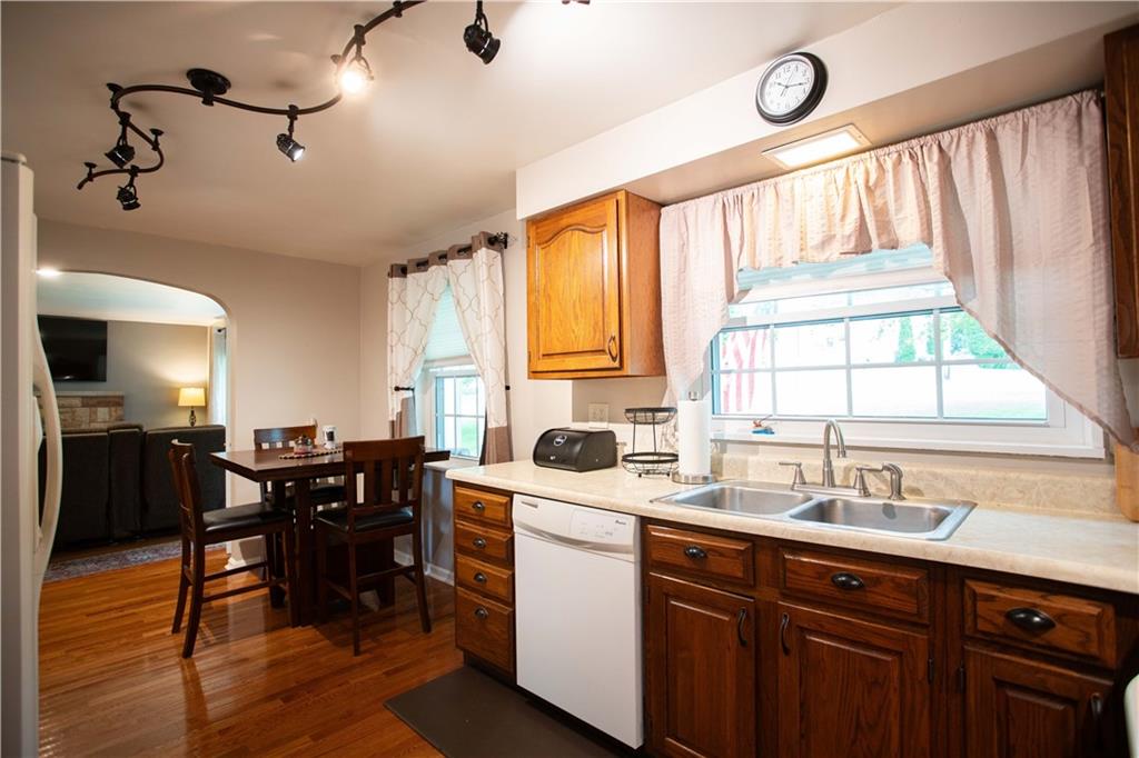 490 Barclay Hill Road Beaver, PA 15009 - Photo 4 of 26 a kitchen with sink a window and dining table