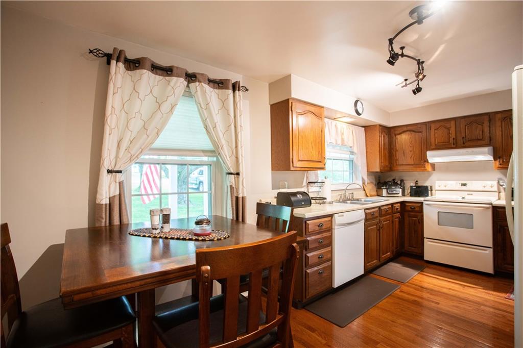 490 Barclay Hill Road Beaver, PA 15009 - Photo 6 of 26 a kitchen with a stove a sink and a refrigerator