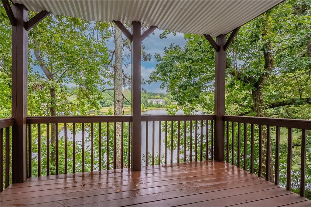 730 Reeves Lake Drive Southwest Marietta, GA 30064 - Photo 15 of 16 a view of balcony with wooden floor