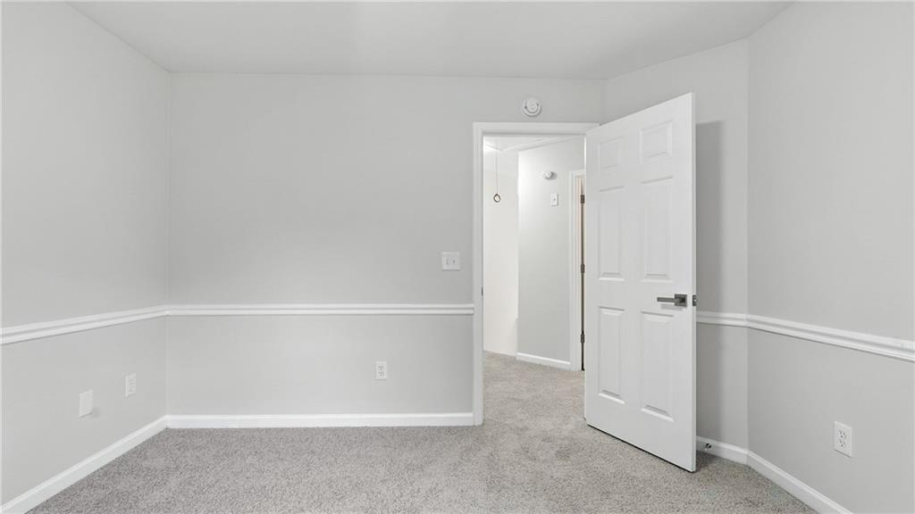 730 Reeves Lake Drive Southwest Marietta, GA 30064 - Photo 8 of 16 a view of an empty room