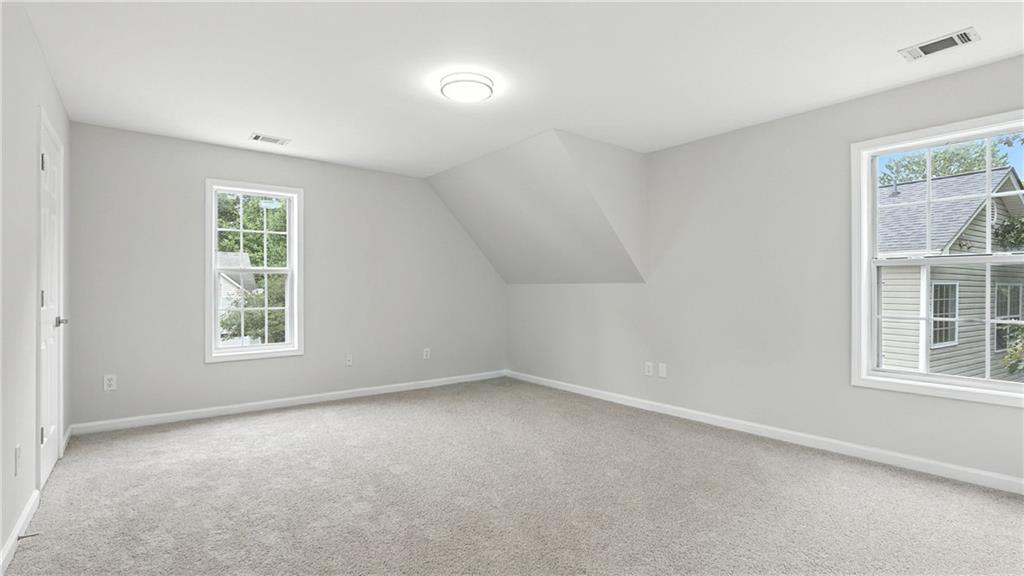 730 Reeves Lake Drive Southwest Marietta, GA 30064 - Photo 9 of 16 an empty room with a window