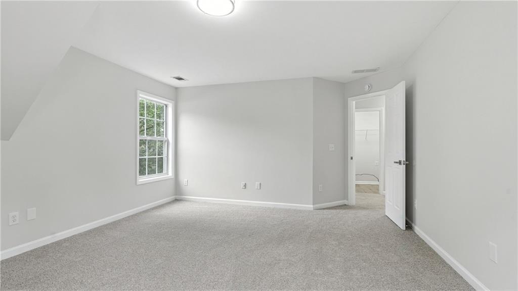 730 Reeves Lake Drive Southwest Marietta, GA 30064 - Photo 10 of 16 a view of an empty room with a window
