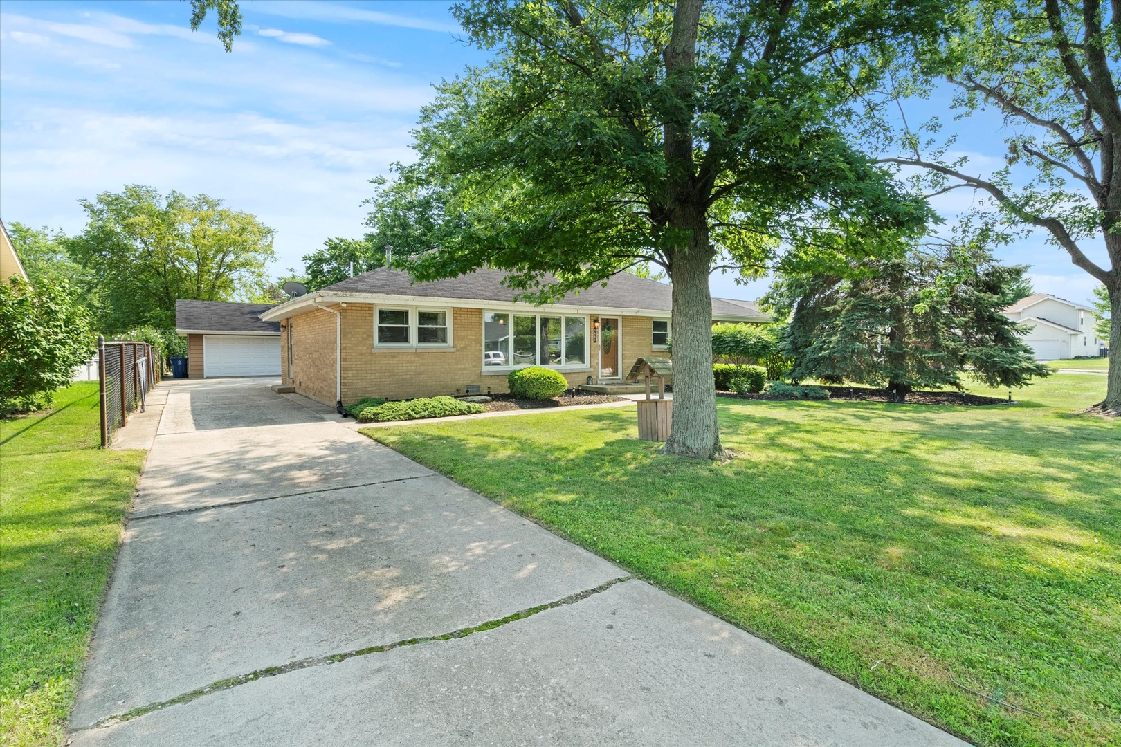 5661 Roosevelt Street Monee, IL 60449 - Photo 2 of 20 a front view of house with yard and green space