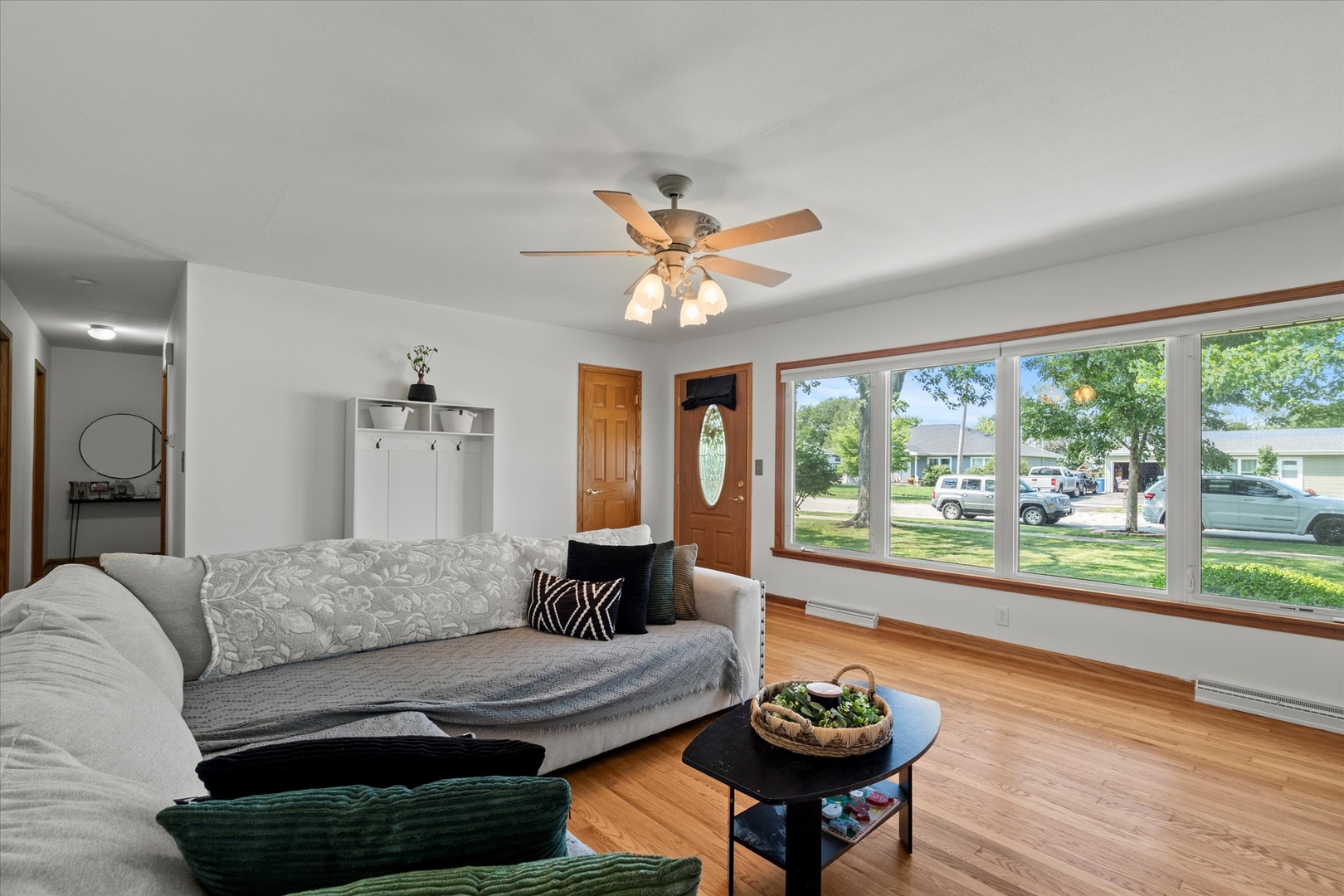 5661 Roosevelt Street Monee, IL 60449 - Photo 3 of 20 a living room with furniture and a large window
