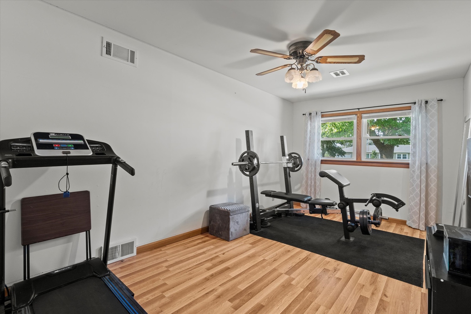 5661 Roosevelt Street Monee, IL 60449 - Photo 9 of 20 a view of a room with gym equipment
