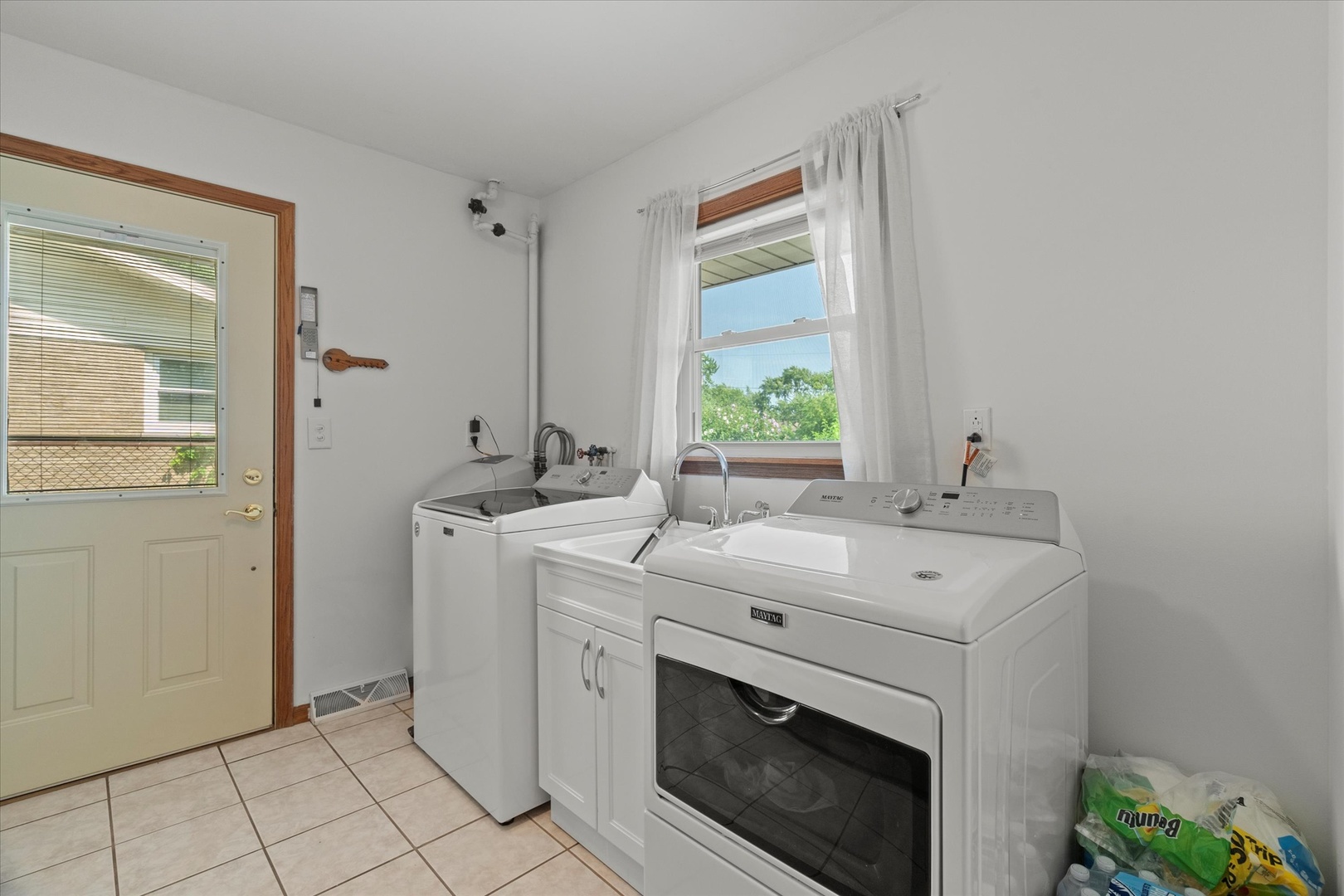 5661 Roosevelt Street Monee, IL 60449 - Photo 10 of 20 a view of bathroom with dual sinks