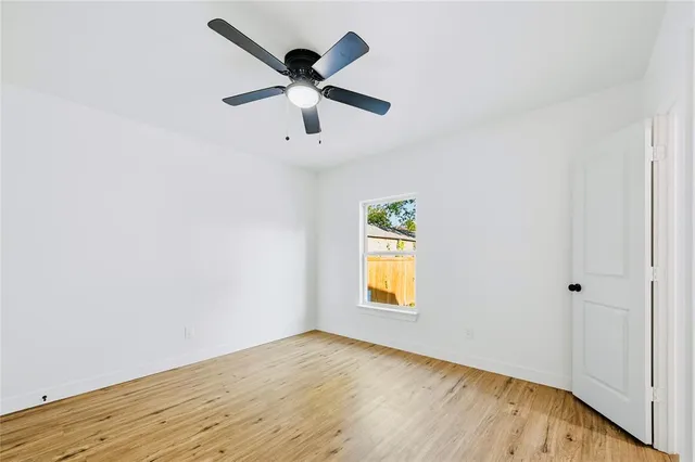 a bathroom with a toilet sink and shower