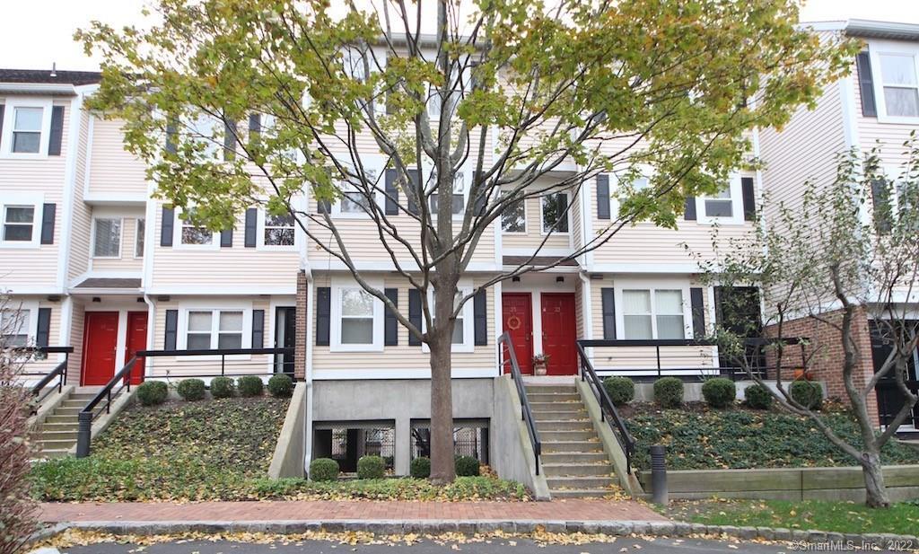 35 Highland Road, Unit 35 Stamford, CT 06902 - Photo 1 of 1 front view of house with a yard