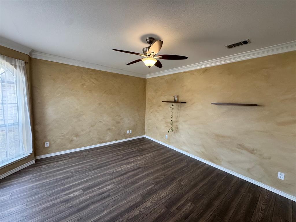 3448 Lark Meadow Way Dallas, TX 75287 - Photo 12 of 39 wooden floor in an empty room with a window