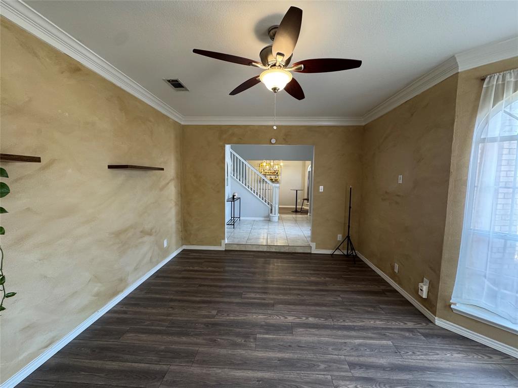 3448 Lark Meadow Way Dallas, TX 75287 - Photo 13 of 39 a view of empty room with wooden floor