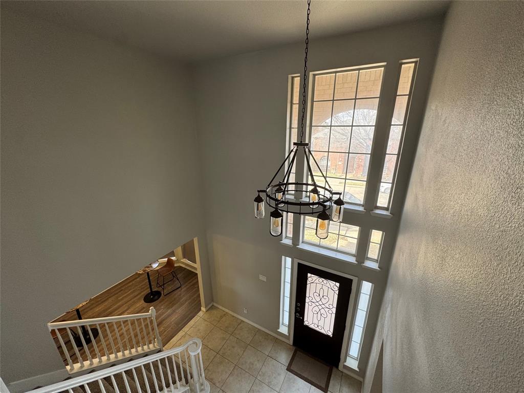 3448 Lark Meadow Way Dallas, TX 75287 - Photo 16 of 39 a view of staircase with a window