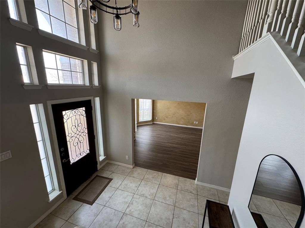 3448 Lark Meadow Way Dallas, TX 75287 - Photo 19 of 39 a view of an entryway with a workspace