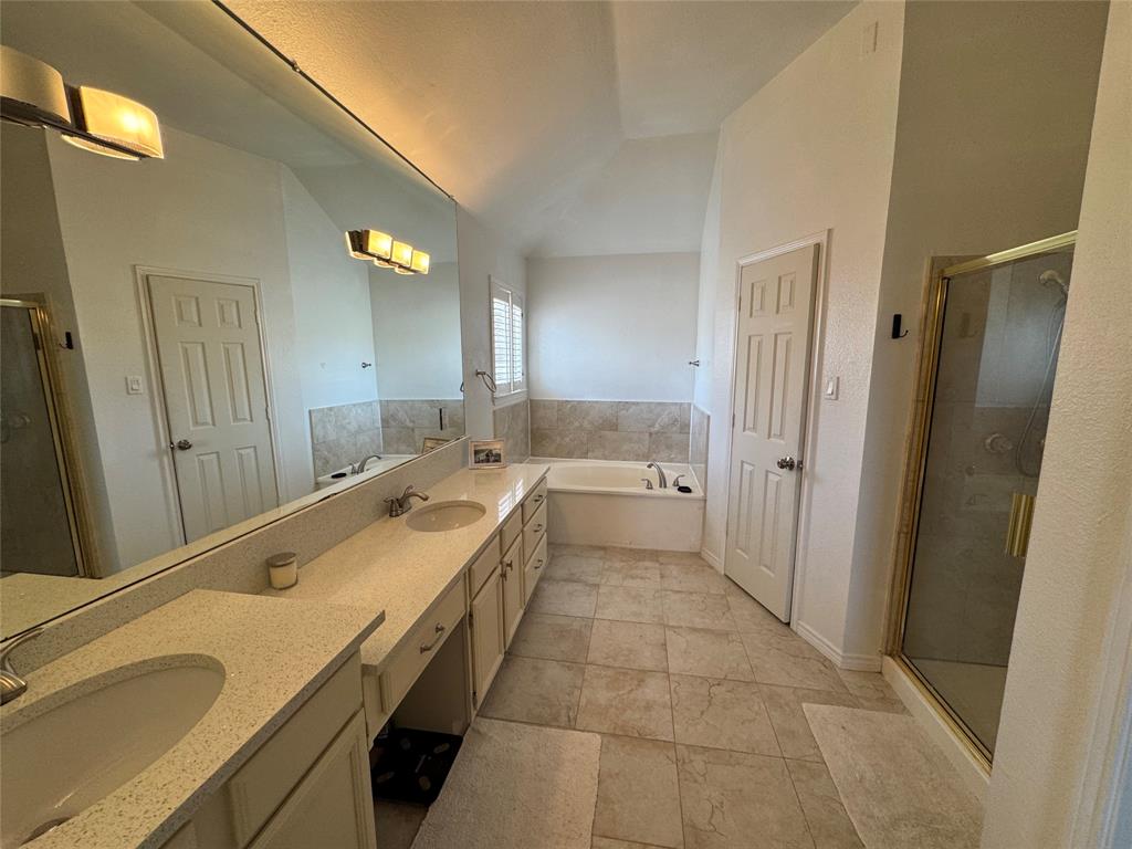 3448 Lark Meadow Way Dallas, TX 75287 - Photo 31 of 39 a bathroom with a granite countertop sink and a large mirror