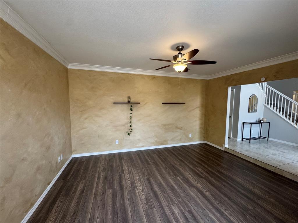 3448 Lark Meadow Way Dallas, TX 75287 - Photo 8 of 39 wooden floor in a hall with a window