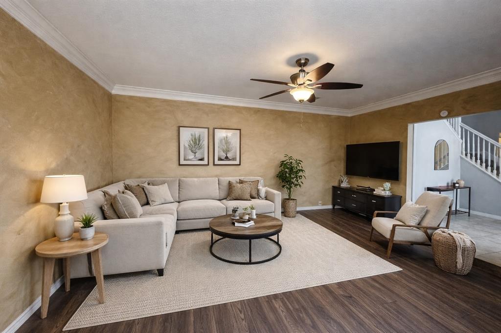 3448 Lark Meadow Way Dallas, TX 75287 - Photo 10 of 39 a living room with furniture and a flat screen tv