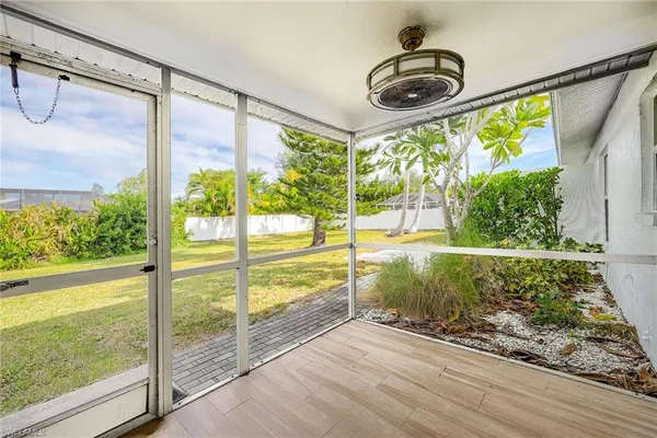 a view of a floor to ceiling window and a floor to ceiling window