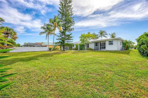 a view of a house with a garden