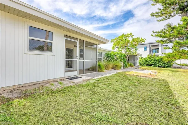 a view of swimming pool with a yard