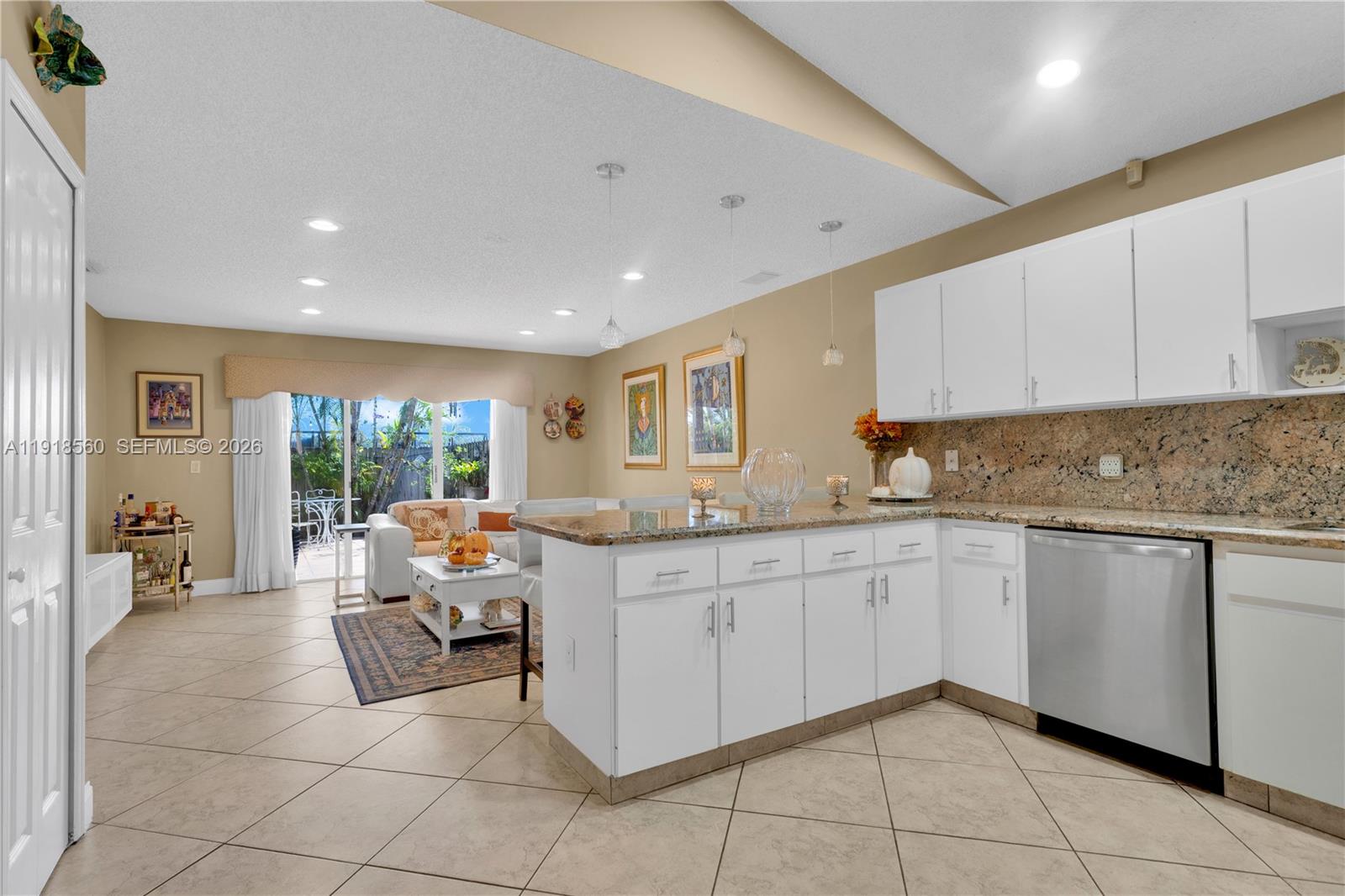 11365 Southwest 143rd Court Miami, FL 33186 - Photo 16 of 40 a kitchen with a sink and cabinets