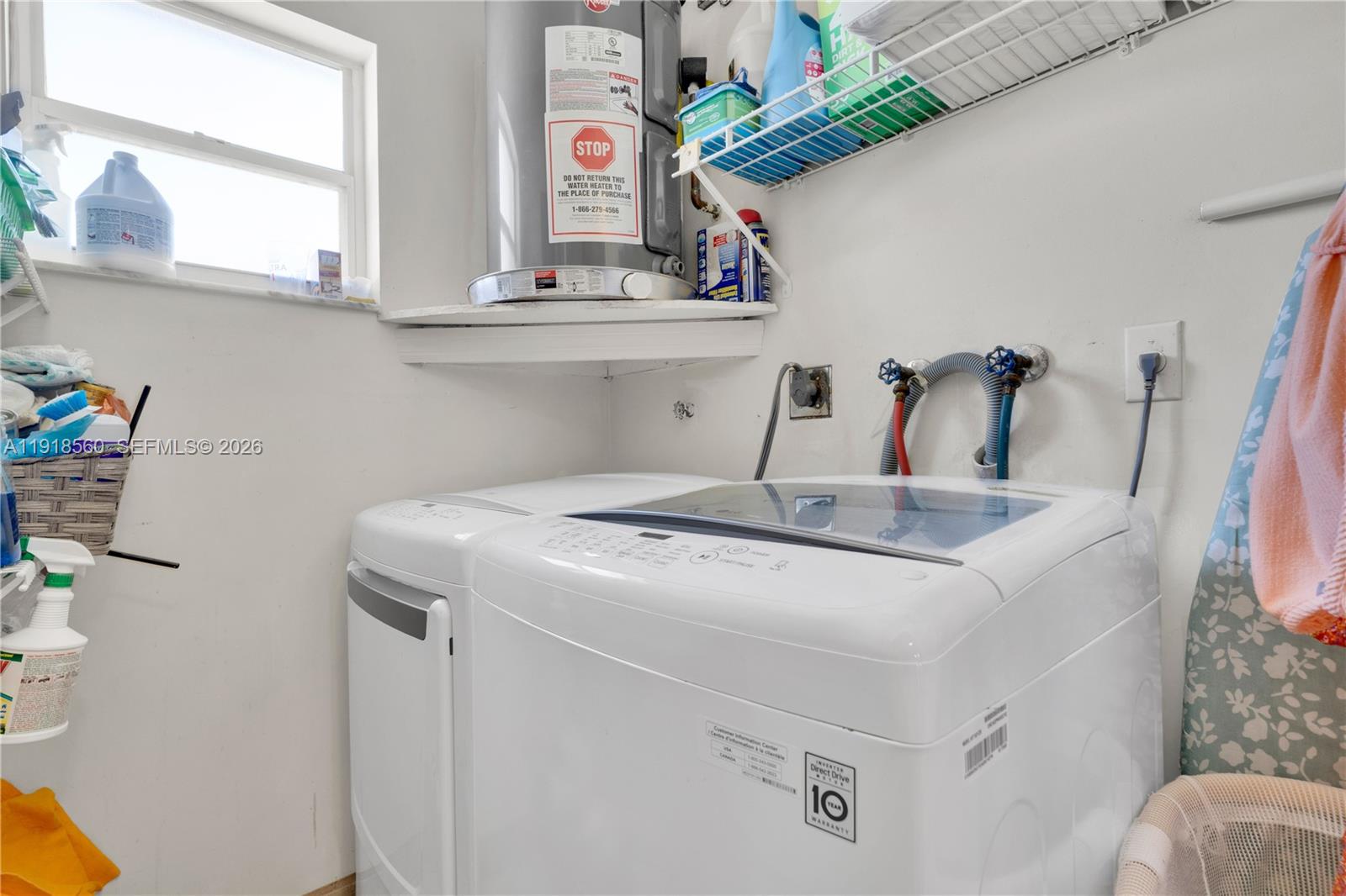 11365 Southwest 143rd Court Miami, FL 33186 - Photo 34 of 40 a bathroom with a sink and a mirror