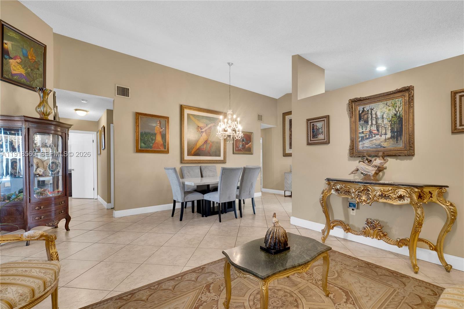 11365 Southwest 143rd Court Miami, FL 33186 - Photo 10 of 40 a living room with furniture and a window