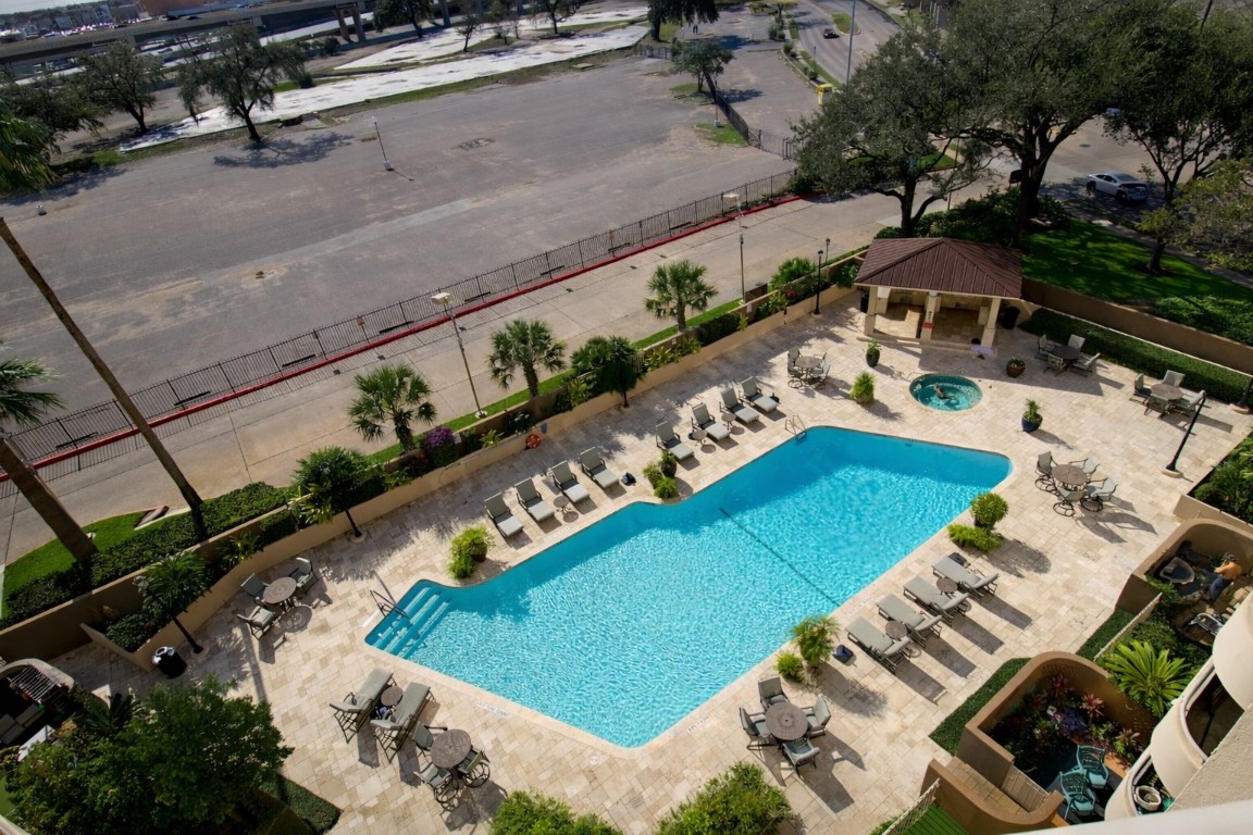 3525 Sage Road, Unit 718 Houston, TX 77056 - Photo 1 of 38 an aerial view of a house a yard and outdoor seating