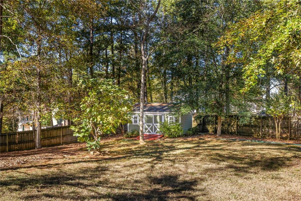 1505 Old John Ward Road Marietta, GA 30064 - Photo 29 of 50 a view of a house with a yard