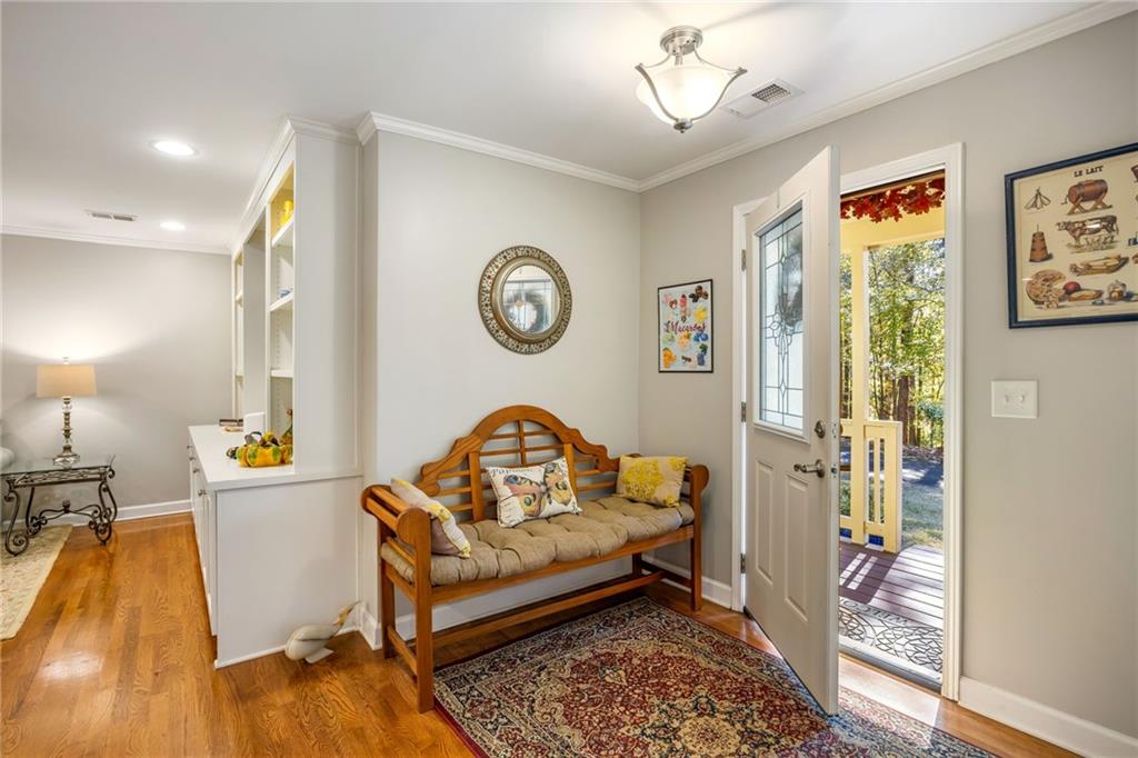 1505 Old John Ward Road Marietta, GA 30064 - Photo 31 of 50 a living room with a couch and a table