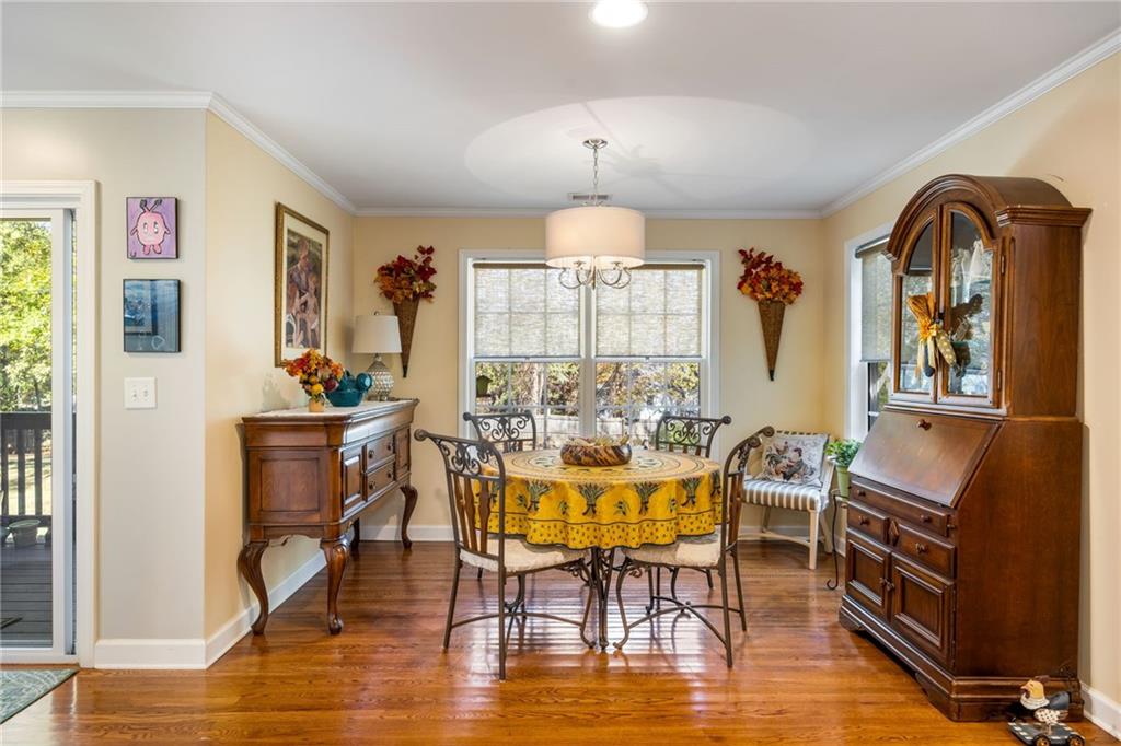 1505 Old John Ward Road Marietta, GA 30064 - Photo 36 of 50 a view of a dining room with furniture window and wooden floor