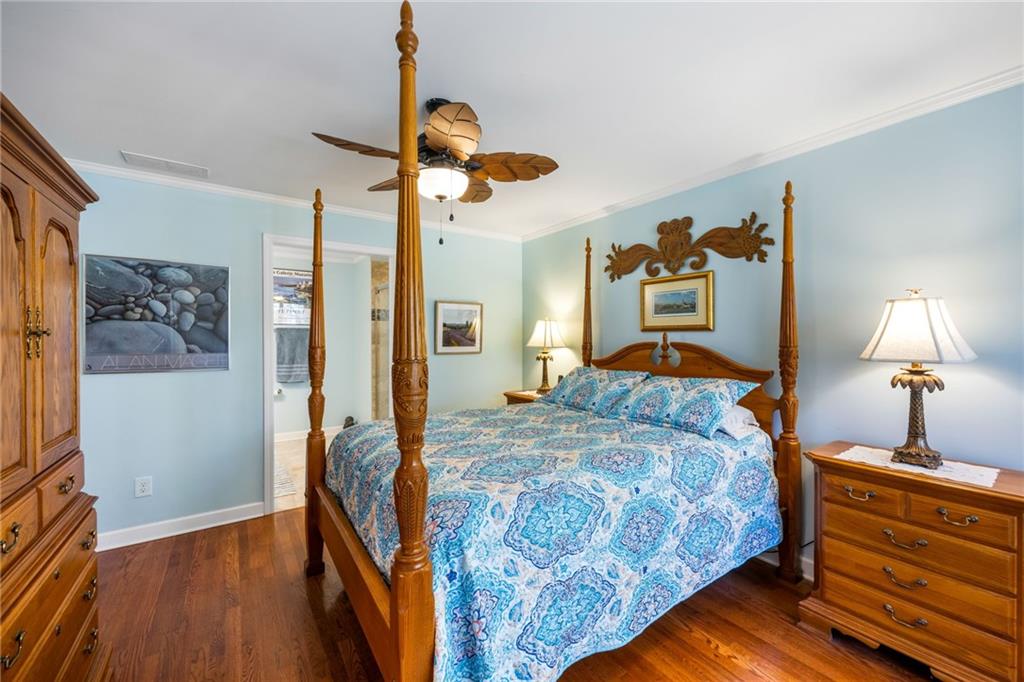 1505 Old John Ward Road Marietta, GA 30064 - Photo 37 of 50 a bedroom with bed and wooden floor