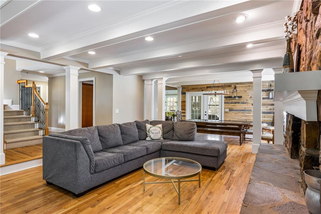 1505 Old John Ward Road Marietta, GA 30064 - Photo 4 of 50 a living room with fireplace furniture and a flat screen tv