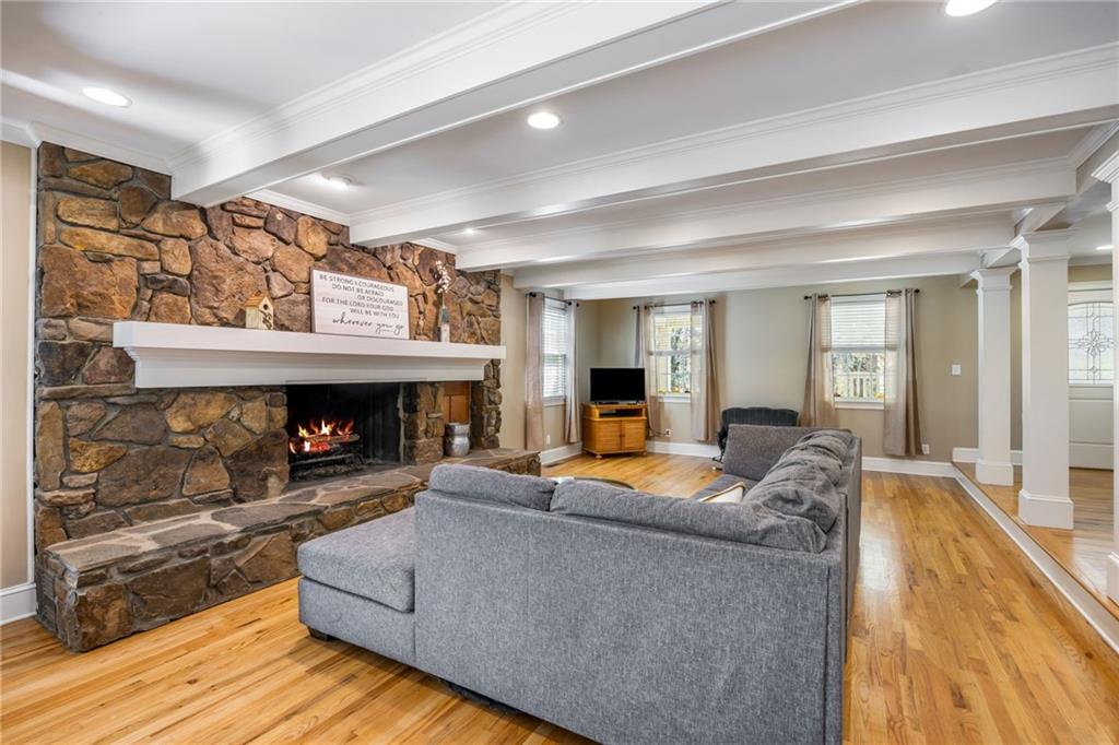 1505 Old John Ward Road Marietta, GA 30064 - Photo 6 of 50 a living room with furniture and a fireplace
