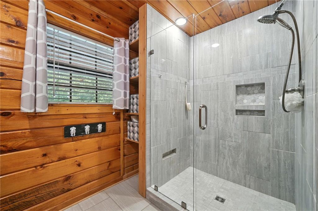 749 Old Federal Road South Chatsworth, GA 30705 - Photo 17 of 45 a bathroom with a shower and a sink