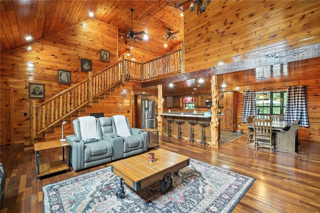 749 Old Federal Road South Chatsworth, GA 30705 - Photo 18 of 45 a living room with lots of furniture and wooden floor