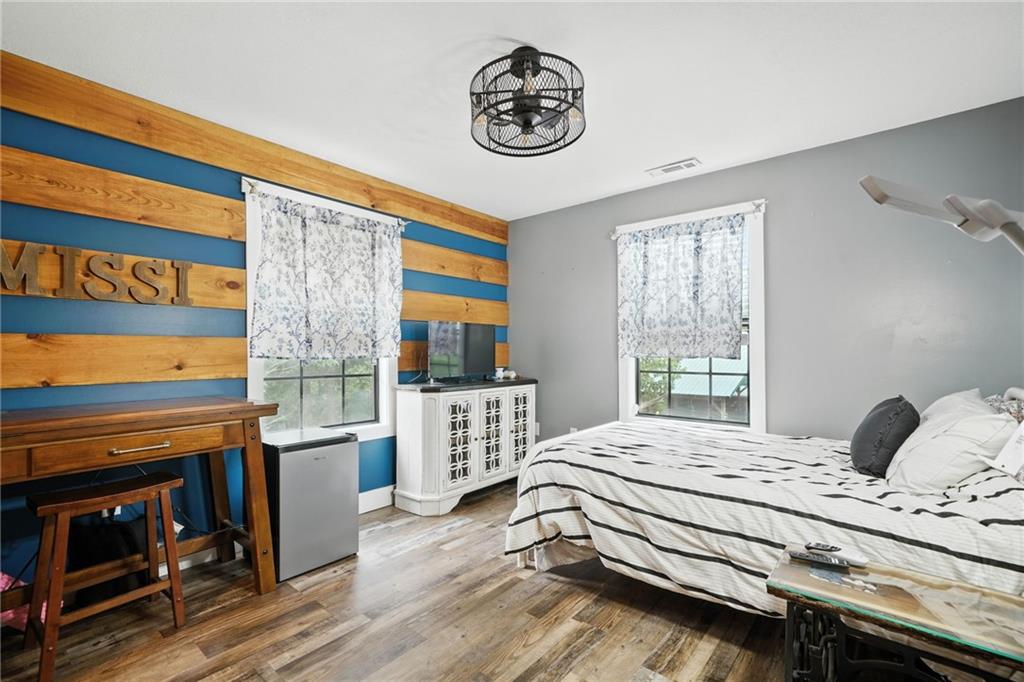 749 Old Federal Road South Chatsworth, GA 30705 - Photo 21 of 45 a bedroom with a bed and a window