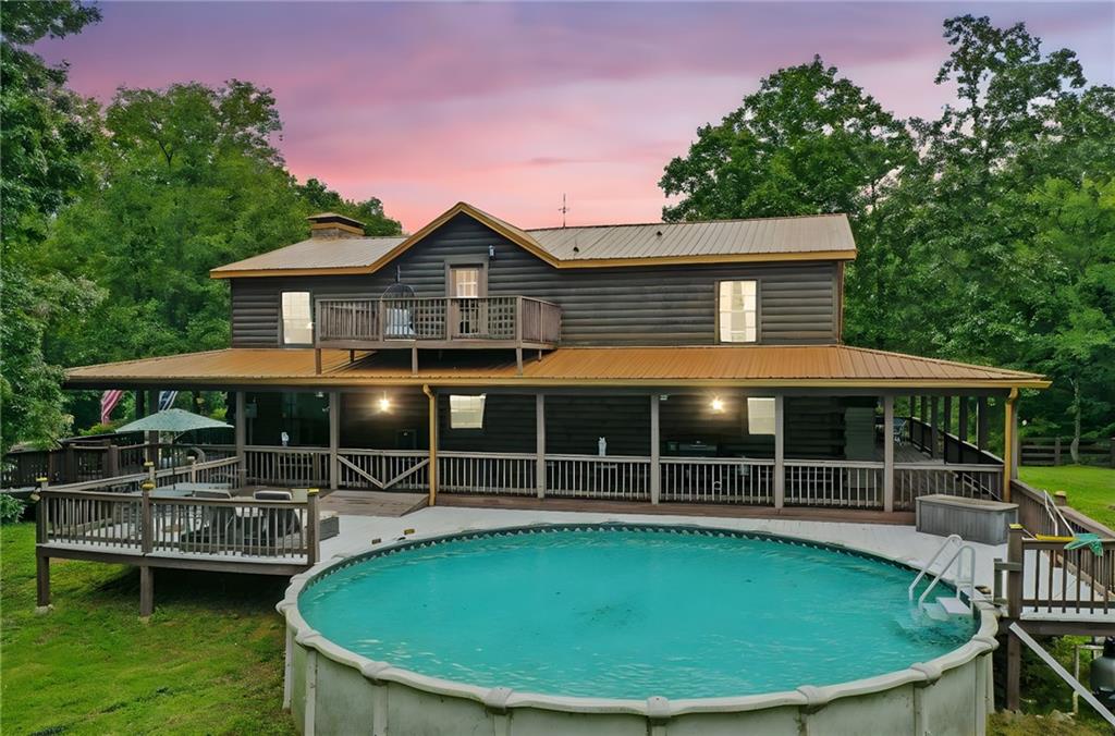 749 Old Federal Road South Chatsworth, GA 30705 - Photo 29 of 45 a view of house with swimming pool and porch