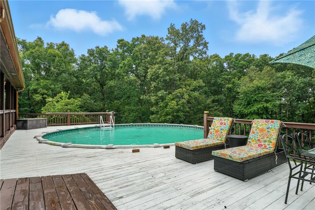 749 Old Federal Road South Chatsworth, GA 30705 - Photo 32 of 45 a view of a backyard with sitting area