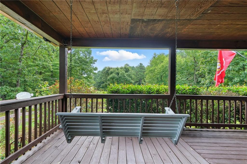 749 Old Federal Road South Chatsworth, GA 30705 - Photo 35 of 45 a view of a balcony with wooden floor