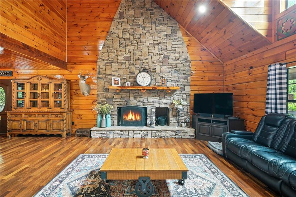 749 Old Federal Road South Chatsworth, GA 30705 - Photo 5 of 45 a living room with fireplace furniture and a flat screen tv