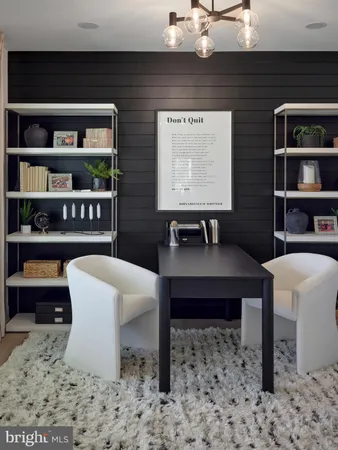 a view of a workspace with furniture