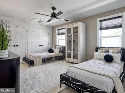 a outdoor space with patio the couches and a fireplace